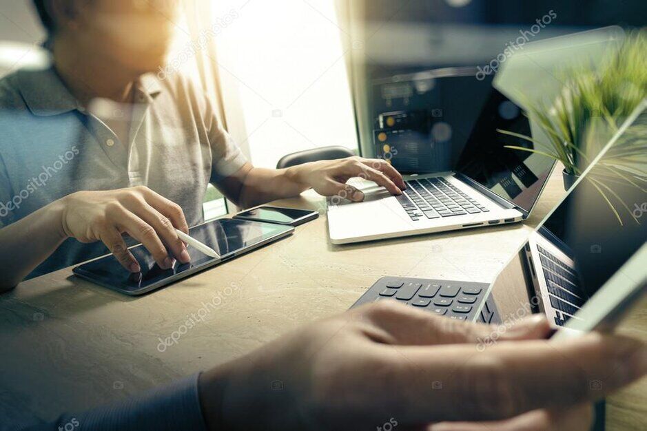 Small business office with team using technology