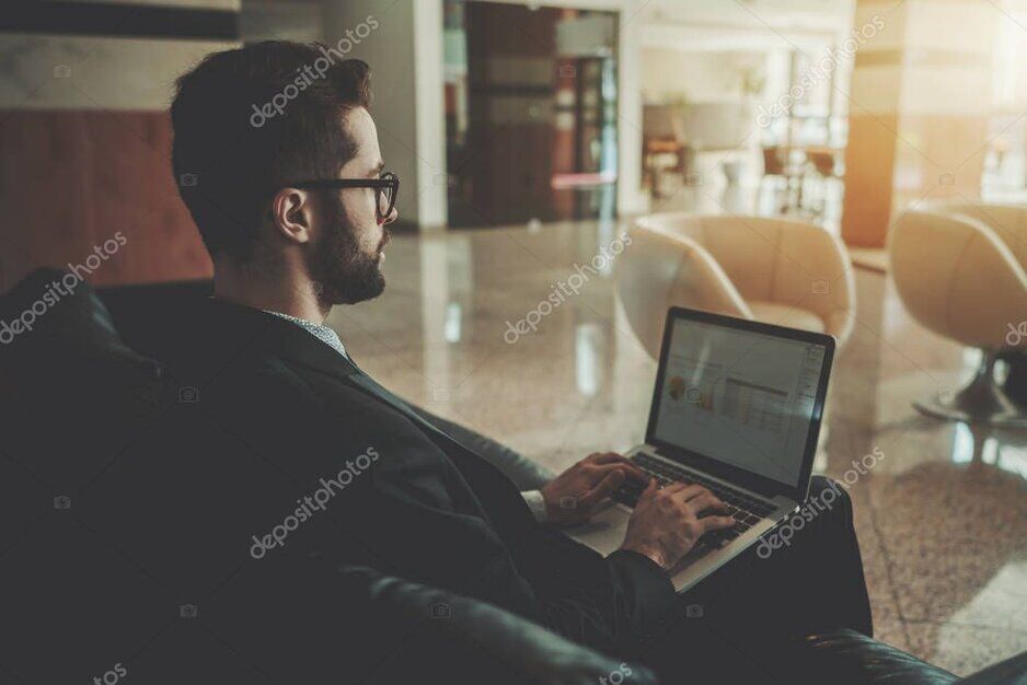 Hotel lobby with guests using WiFi
